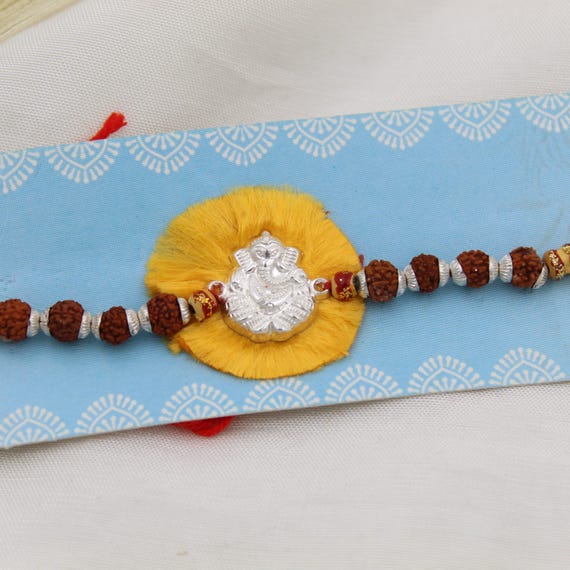 Handmade Silver Ganesh Rakhi, Yellow Thread, Beads, Hindu Raksha Bandhan Gift