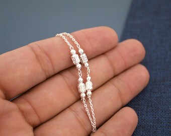 Handmade Sterling Silver Double Chain Bracelet: Ethnic Bead Charm