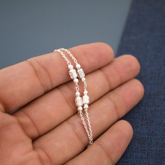 Handmade Sterling Silver Double Chain Bracelet: Ethnic Bead Charm
