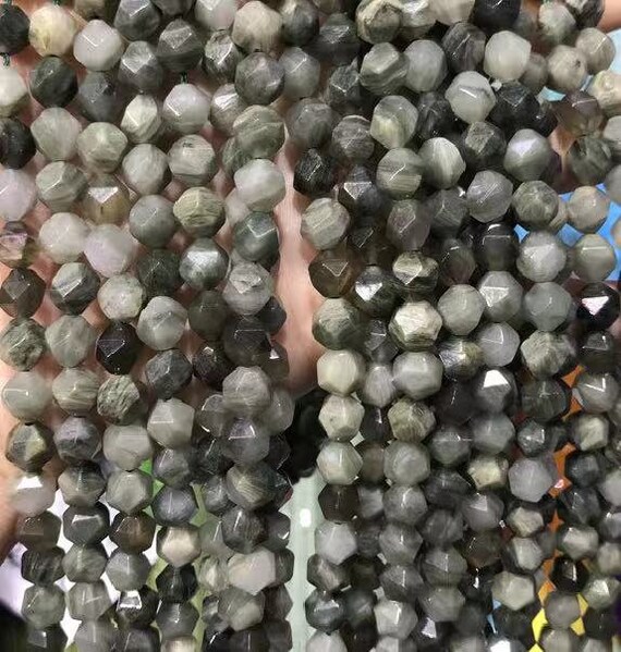 NATURAL RUTILATED QUARTZ ROUND 14mm FACETED BEADS 15" STRAND NATURAL RUTILATED QUARTZ ROUND 14mm FACETED BEADS 15" STRAND