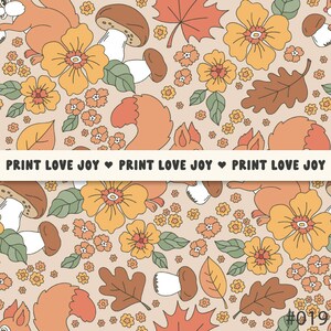 May include: A seamless pattern featuring squirrels, mushrooms, flowers, and leaves in shades of orange, brown, and yellow. The pattern is repeated throughout the image and includes the text "PRINT LOVE JOY" repeated three times.