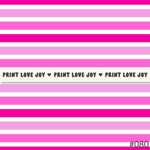 May include: Pink and white striped background with the text "PRINT LOVE JOY ♥ PRINT LOVE JOY ♥ PRINT LOVE JOY" in black text. The background is a repeating pattern of horizontal stripes.