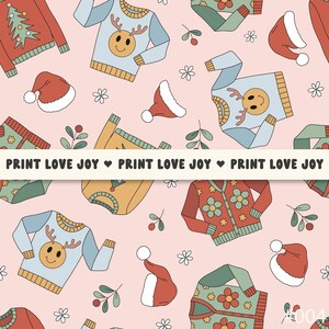 May include: A seamless pattern featuring a variety of colorful Christmas sweaters with reindeer, Christmas trees, and floral designs. The background is a light pink color. The text "PRINT LOVE JOY" is repeated across the pattern.