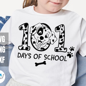 May include: White t-shirt featuring a black and white dalmatian dog design. The design includes the numbers "101" and the text "Days of School".