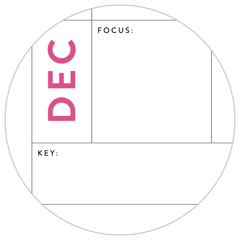 K&ouml;nnte beinhalten: Ein wei&szlig;er runder Planer mit einem schwarzen Raster und dem Wort "DEC" in rosa Schrift. Der Planer hat Abschnitte mit den Bezeichnungen "FOCUS" und "KEY".