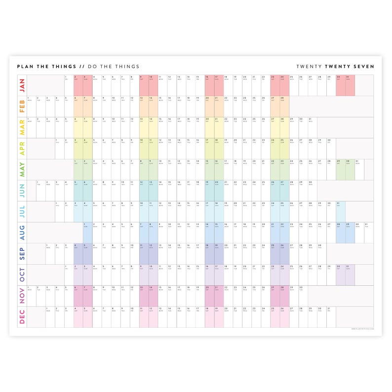 May include: A wall calendar for the year twenty twenty seven with the text PLAN THE THINGS // DO THE THINGS at the top left and TWENTY TWENTY SEVEN at the top right. The grid features months in rows and days in columns with vertical colour bands.