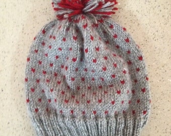 Knit hat.  Adult hat.  Acrylic hat.  Winter hat.  Warm hat.  Hat with pom pom.  Hat with heart flecks. #3