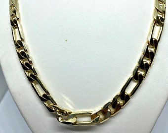May include: A gold chain necklace with a thick, flat, box-style chain. The chain is made of interlocking links that are rectangular in shape.