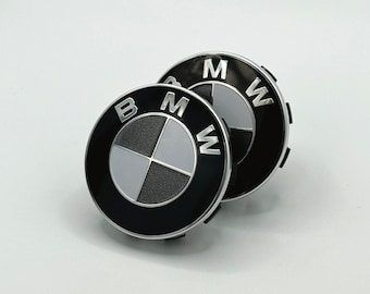 Pegatinas decorativas de colores con el emblema de BMW para las tapas centrales de las ruedas.