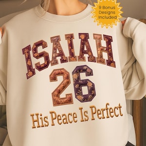 Könnte beinhalten: Cremefarbenes Sweatshirt mit dem Text "ISAIAH 26 His Peace Is Perfect" in floralem Design. Die Zahl "26" ist ebenfalls abgebildet. Ein gelber Stern mit der Aufschrift "9 Bonus Designs Included" befindet sich oben rechts.
