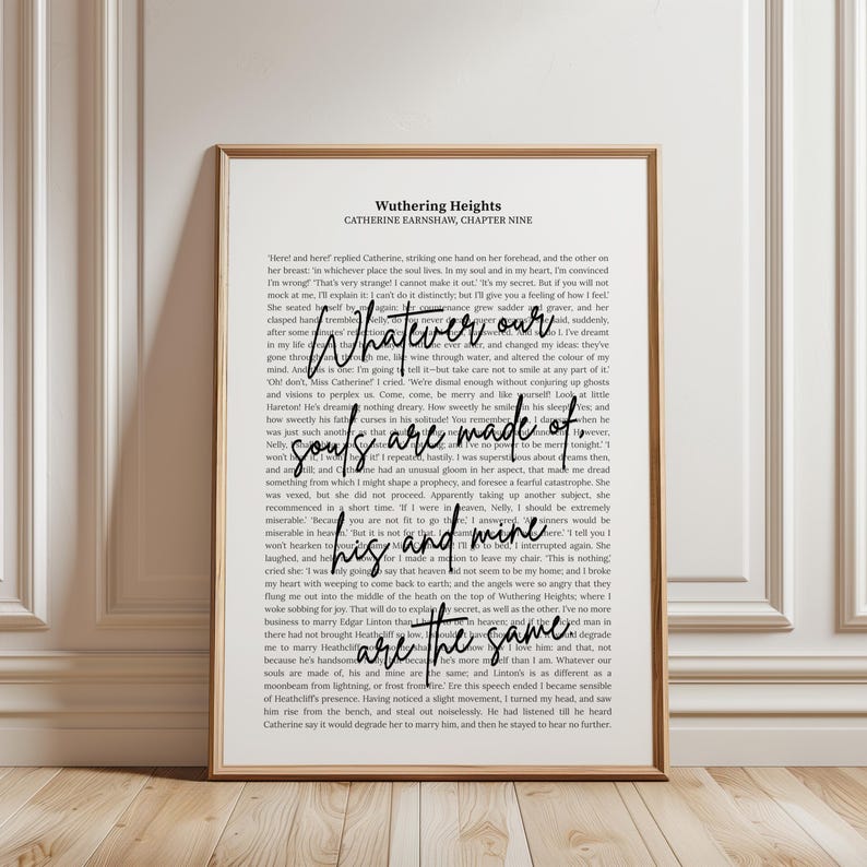 May include: A framed print featuring text from "Wuthering Heights" by Catherine Earnshaw. The quote "Whatever our souls are made of, his and mine are the same" is highlighted in a stylish font. The print is in black and white.