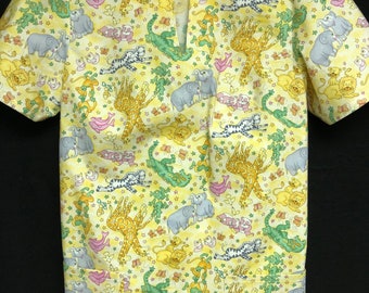 Ladies animal print scrub top size “Medium”