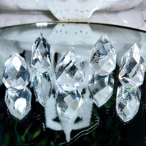 Faceted rock crystal point