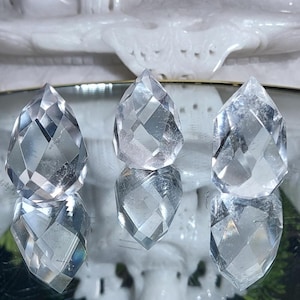 Faceted rock crystal point