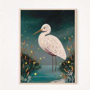 May include: A white egret stands in a pond with tall reeds and glowing fireflies. The egret has a long, thin beak and long legs. The background is a dark blue with a starry sky.