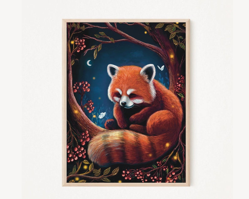 May include: A framed art print featuring a red panda curled up on a tree branch. The artwork has a dark blue background with a crescent moon, butterflies, and berries. The red panda has orange fur with a striped tail.