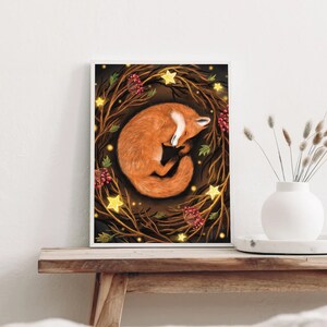 May include: A digital illustration of a red fox curled up asleep in a wreath of brown branches with red berries and yellow stars. The background is dark blue.