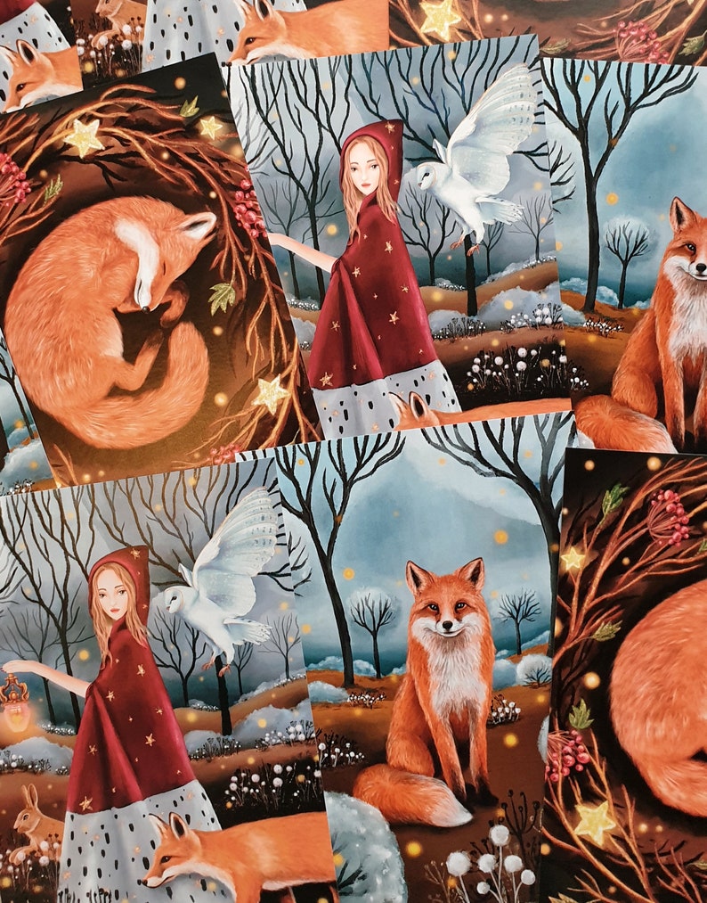 May include: A set of five illustrated cards featuring a red-hooded girl, a white owl, and foxes in a winter forest setting. The cards have a whimsical and magical feel.