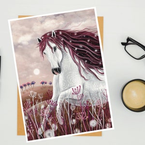 May include: A white horse with a long, flowing mane of pink and white hair runs through a field of pink flowers. The horse has a white swirl pattern on its body and a pink nose.