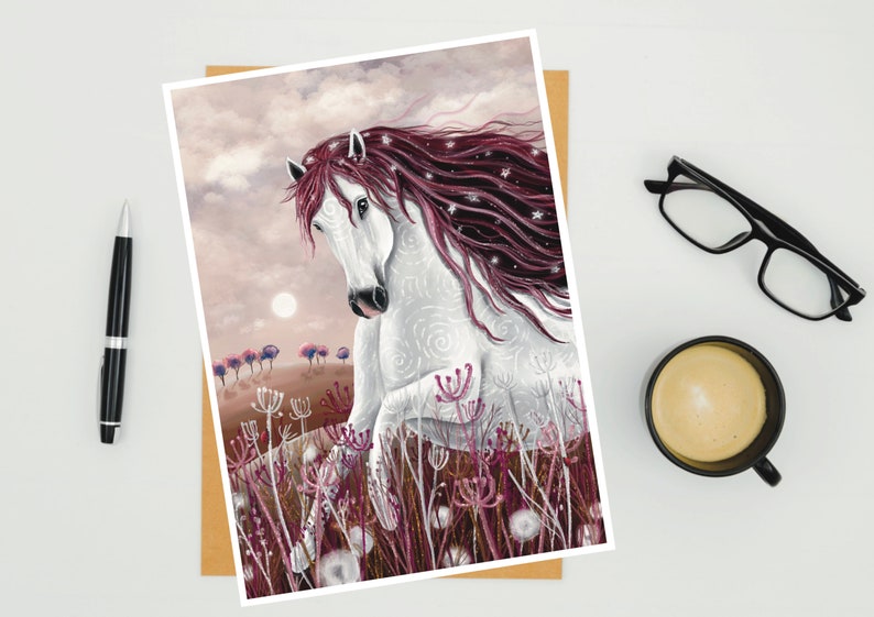 May include: A white horse with a long, flowing mane of pink and white hair runs through a field of pink flowers. The horse has a white swirl pattern on its body and a pink nose.