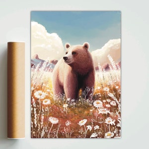 May include: A framed art print of a brown bear standing in a field of white wildflowers. The bear is facing to the side, with a blue sky and fluffy clouds in the background. A rolled-up poster is on the left.