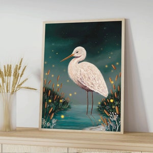 May include: A white egret stands in a dark blue pond with green reeds and glowing yellow fireflies. The egret has a long, thin beak and long, slender legs. The background is a dark blue sky with a few stars.