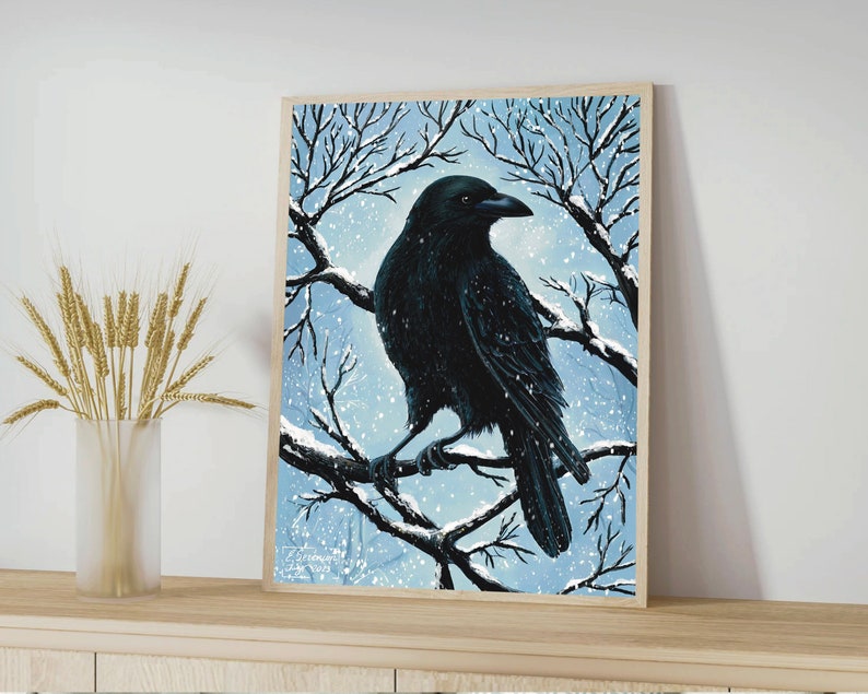 May include: A black crow perched on a bare branch in a snowy winter scene. The crow is facing right and has its wings folded. The background is a light blue with white snow falling.