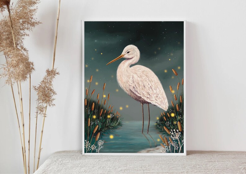 May include: A white egret stands in a body of water with a dark blue background. The egret is surrounded by tall green reeds and glowing yellow fireflies.