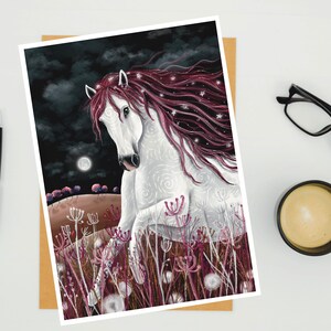 May include: A white horse with a long, flowing mane of pink and white hair runs through a field of pink flowers under a dark sky with a full moon. The horse's coat is covered in white swirls and the mane is dotted with white stars.
