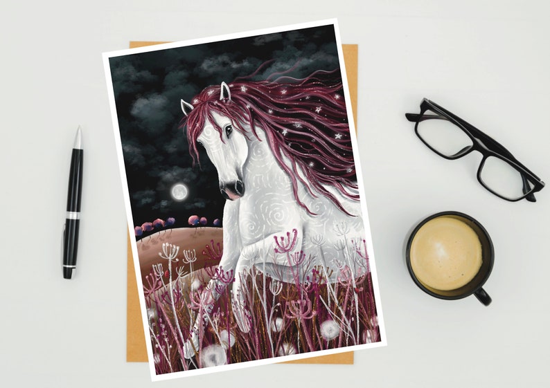 May include: A white horse with a long, flowing mane of pink and white hair runs through a field of pink flowers under a dark sky with a full moon. The horse's coat is covered in white swirls and the mane is dotted with white stars.