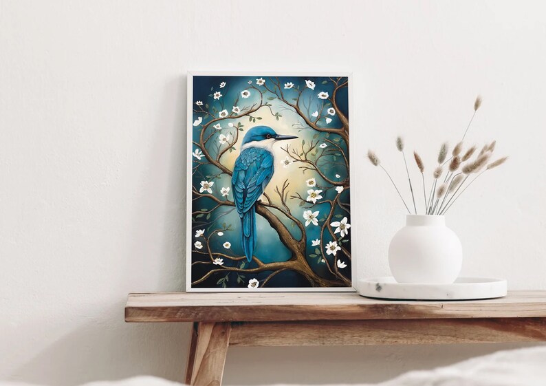 May include: A blue and white bird perched on a branch with white flowers. The bird is surrounded by a dark blue background with a soft glow.