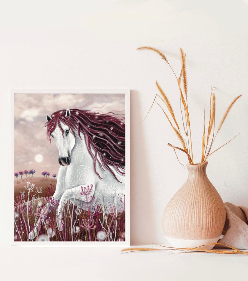 May include: A white horse with a long, flowing mane of pink and purple runs through a field of pink and white flowers. The horse has a white and gray swirl pattern on its body. The background is a soft, pink and gray sky.