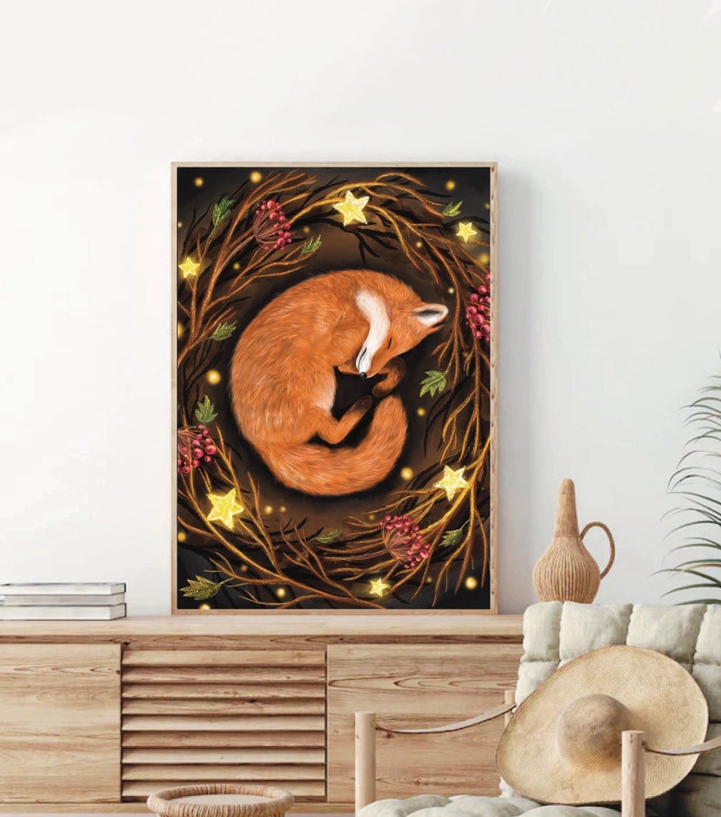 May include: A digital illustration of a red fox curled up asleep in a wreath of branches with glowing stars and red berries.