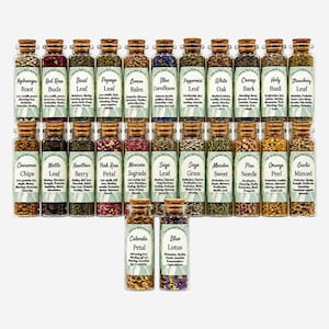 May include: A collection of twenty-three small glass vials with cork stoppers, each filled with different dried herbs, flowers, and barks. Each vial features a white label with the name of the botanical and a list of associated properties.