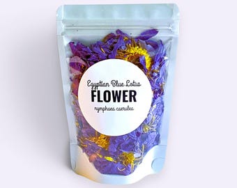 May include: A clear resealable pouch filled with dried blue and yellow Egyptian Blue Lotus flower petals. A white circular label on the front features the text Egyptian Blue Lotus FLOWER nymphaea caerulea in black lettering.