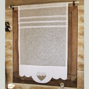 Small curtain for an open kitchen window.