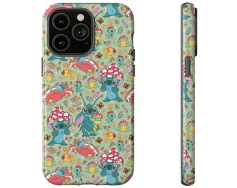 May include: A green phone case with a repeating pattern of blue Stitch characters from Lilo & Stitch, mushrooms, butterflies, and frogs. The case has a cutout for the camera lens.