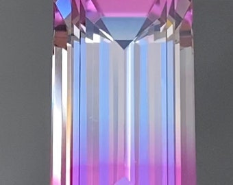 Bicolor lab sapphire 13.53 x 6.86 x 5.87, 6.10 carats, bicolor pink/purple lab grown sapphire, emerald cut. Precision cut