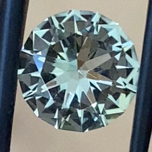 Prasiolite:1.20 carats, 7.67 x 4.63 mm. Round brilliant cut prasiolite, green amethyst, natural prasiolite, Brazil. Untreated