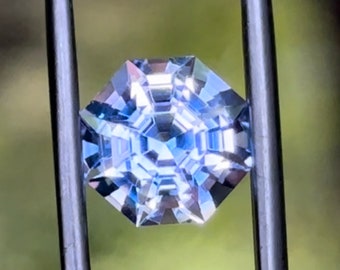 Light blue lab sapphire 9.23 x 9.07 x 6.96mm, custom octagonal step cut. Periwinkle, 4.30 carats, light blue lab sapphire. Precision cut