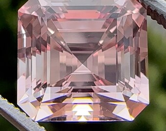 Peach pink lab sapphire 6.90 carats, 9.83 x 9.83 x 7.67 mm. Asscher cut lab sapphire. Precision cut