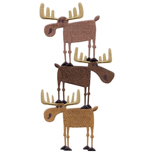 May include: Three stacked moose figures in shades of brown and tan, with large antlers and long legs. The moose are arranged vertically, one on top of the other, against a white background. The design has a whimsical, cartoonish style.