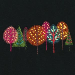 May include: An embroidery design on a black background featuring a row of stylized trees in various shapes and colors, including pink, green, orange, and blue, with intricate stitched patterns representing leaves, branches, and trunks.