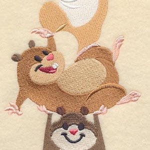 May include: Embroidered design of three smiling hamsters stacked on top of each other. The hamsters are brown and tan with pink accents. The bottom hamster is holding up the other two.