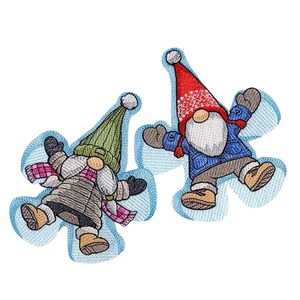 May include: Two embroidered patches featuring gnomes making snow angels. One gnome wears a green hat and pink plaid scarf, the other a red hat with white snowflake patterns and a blue jacket. Both have white beards and tan boots.