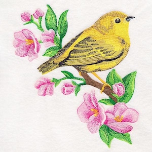 May include: Embroidered image of a yellow bird perched on a brown branch with pink flowers and green leaves. The bird has black markings on its wings and back. The flowers are in full bloom and the image is on a white background.