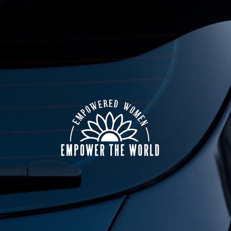 May include: White vinyl sticker with a stylized sunflower and the text "Empowered Women Empower the World".