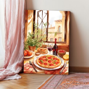 Puede incluir: Una pintura que representa una mesa puesta con una pizza, una copa de vino tinto, una botella de vino tinto, un cuenco de cerezas rojas, un plato de tomates, una hogaza de pan y un lim&oacute;n. La mesa est&aacute; cubierta con un mantel a cuadros rojos y blancos. La pintura est&aacute; situada frente a una ventana con vistas a un edificio con un balc&oacute;n.