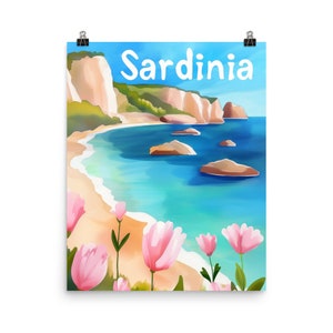 May include: A watercolor painting of a beach scene in Sardinia, Italy. The painting features a blue ocean, white sand, and green cliffs. Pink flowers are in the foreground.