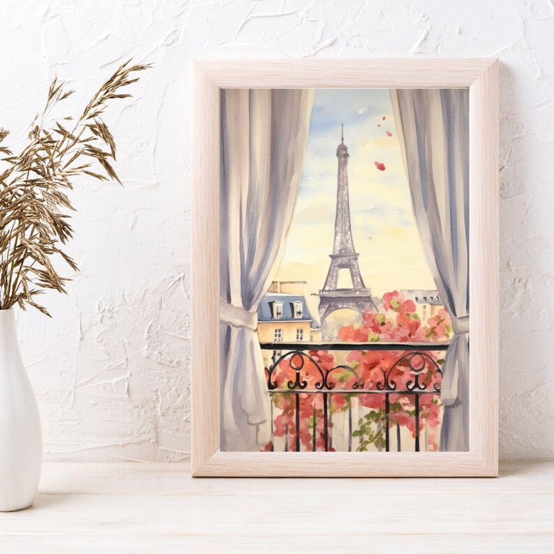 May include: A framed watercolor print depicting a view from a window with white curtains, looking out onto the Eiffel Tower in Paris. The scene includes a black wrought iron balcony railing adorned with vibrant pink flowers under a soft sky.